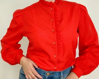 red ruffle front blouse
