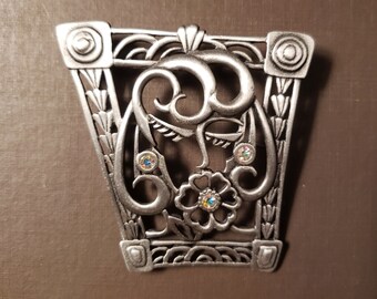 Abstract silver tone brooch