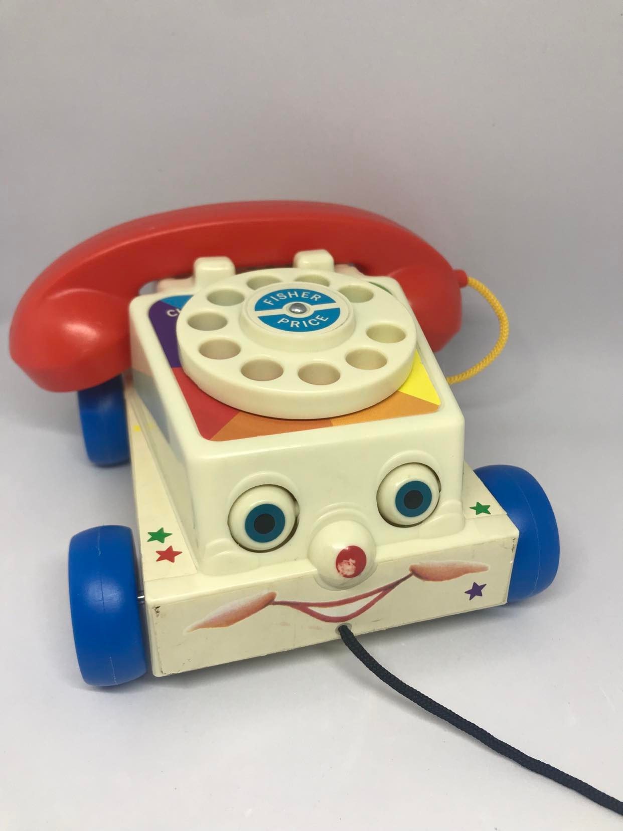 Vintage 1985 Fisher Price Rotary Telephone Pull Toy With Receiver, Telephone  Sound Effects and Eyes That Move When Phone is Rolling 