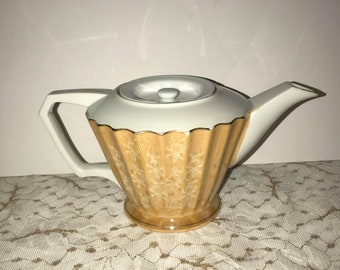 Vintage Tea Pot With Lid  Peach Luster Ware With White Flowers on the sides.Very unusual shape no Chips Or Cracks.Mothers Day Table Setting.