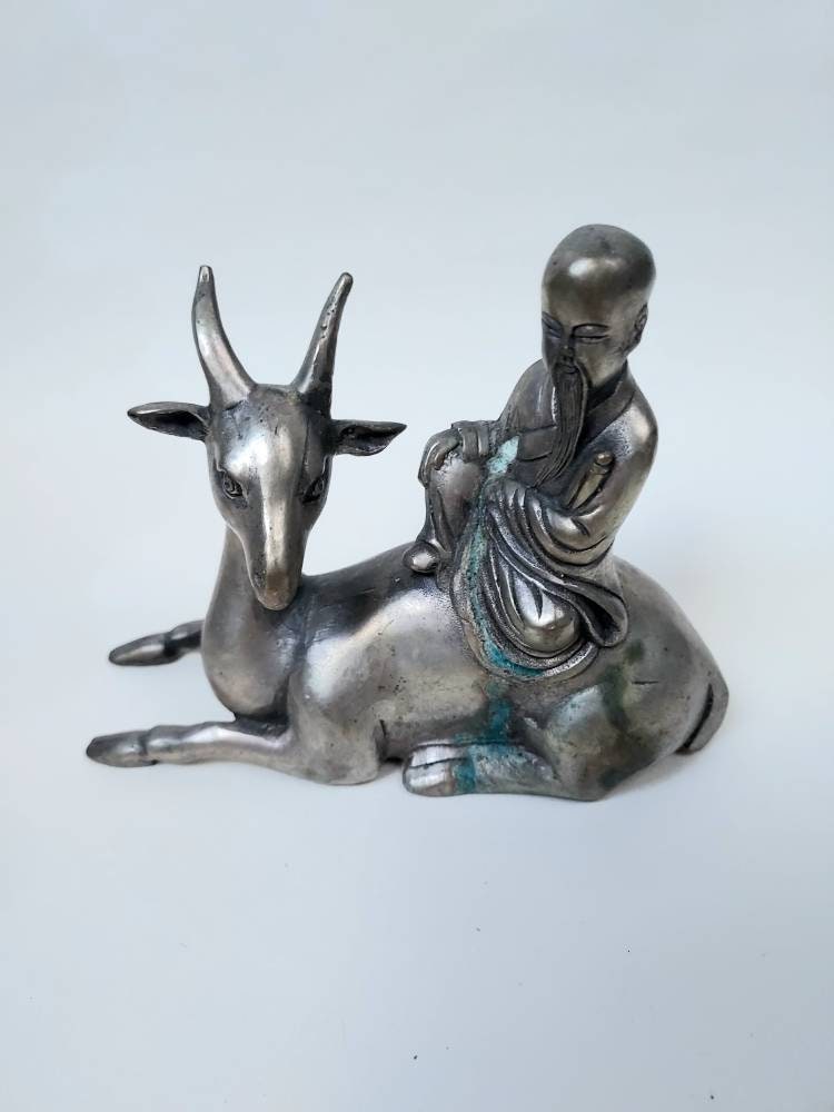 Chinese Metal Figure Riding Antelope