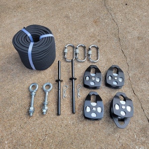 Pulley system for aerial rig
