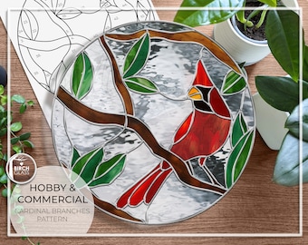 May include: A stained glass pattern of a cardinal perched on a branch with green leaves. The pattern is titled "Cardinal Branches Pattern" and is for hobby and commercial use.