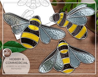 May include: Three stained glass bee patterns in two sizes. The bees are yellow and black with gray wings. The patterns are labeled "Hobby & Commercial" and "x3 Bees in x2 Sizes Patterns".