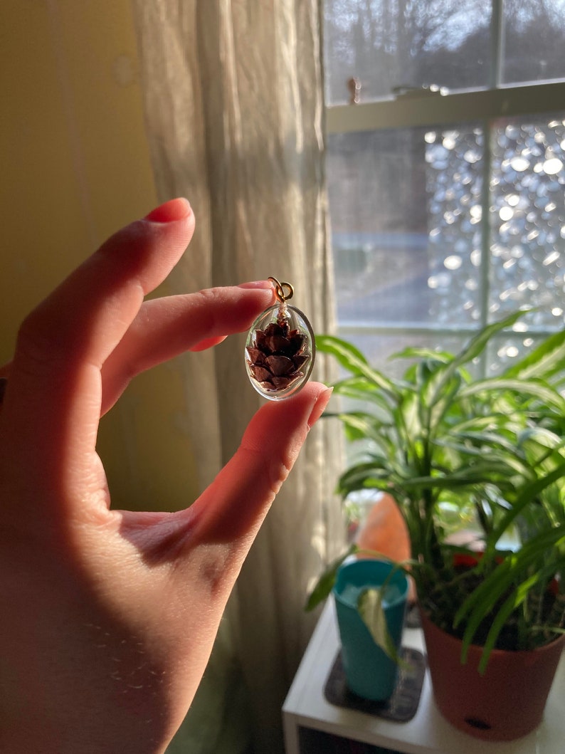mini male pinecone pendant