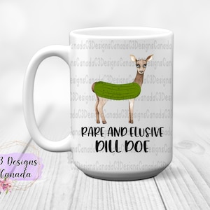 May include: White ceramic mug with a cartoon deer wearing a green pickle costume. The text "RARE AND ELUSIVE DILL DOE" is printed in black below the deer.