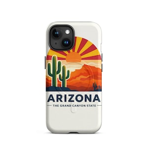 May include: A white phone case with a desert landscape design. The design features a rising sun with red and yellow rays, green cacti, and the word "ARIZONA" with "THE GRAND CANYON STATE" below.