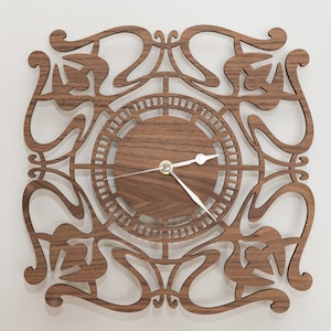 May include: A wooden wall clock with a decorative, intricate design featuring a floral motif. The clock face is made of wood and has silver hands.