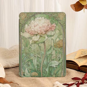 May include: A rectangular tablet case featuring a large, pale pink peony flower centered against a soft green background with intricate, flowing botanical line work and decorative arched framing elements that extend to the edges of the cover.