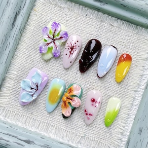 Almond Press On Nails with Sunset Gradient and Pastel Floral Designs, Ideal for Springtime Outings or Feminine Daily Style, Fake Nail Option
