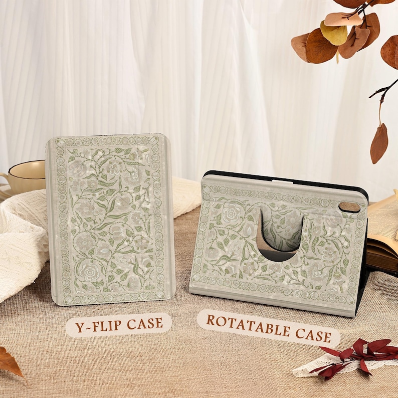May include: Two tablet cases with a floral design in light gray and green. One is a Y-flip case, and the other is a rotatable case. The cases have a rectangular shape with a decorative border and are made of a durable material.