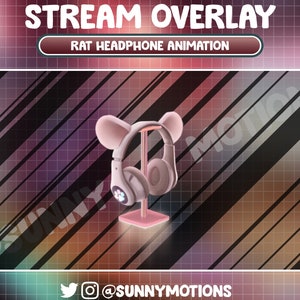May include: A pink and white animated rat headphone stand with a pink base and a pink and white headphone with cat ears. The stand is on a pink and black striped background with the text "STREAM OVERLAY" and "RAT HEADPHONE ANIMATION" at the top.