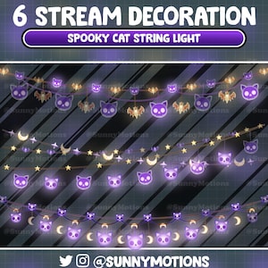 Op de afbeelding: Zes paarse katten-lichtjes met een schedelontwerp, elk met een halve maan en een ster die aan de string hangt. De lampjes bevinden zich op een donkere achtergrond met diagonale strepen.