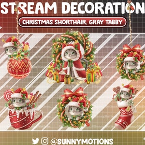 Op de afbeelding: Set van zes kerstversieringen met een grijze tabbykat in verschillende feestelijke poses. De versieringen omvatten een kat met een kerstmanmuts in een rood-witte mok, een kat met een kerstmanmuts in een kous, een kat met een kerstmanmuts in een rood-witte kerstbal, een kat met een kerstmanmuts in een krans, een kat met een kerstmanmuts in een rood-witte kerstbal en een kat met een kerstmanmuts in een rood-witte kerstbal.