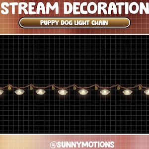 May include: A string of lights with puppy dog faces and gold bells. The lights are white and the string is brown. The text "Puppy Dog Light Chain" is displayed above the lights.