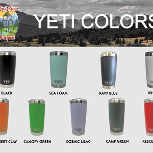 May include: A display of ten YETI Rambler tumblers in various colors, including black, sea foam, navy blue, white, high desert clay, canopy green, cosmic lilac, camp green, and rescue red.