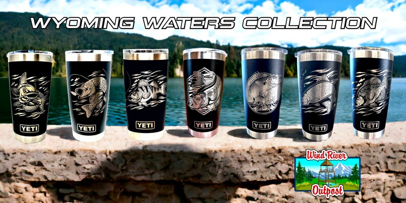 May include: A set of six black YETI tumblers with silver lids, each featuring a different engraved design of a fish in water. The tumblers are arranged in a row on a stone surface. The text "WYOMING WATERS COLLECTION" is displayed above the tumblers. The text "Wind River Outpost" is displayed below the tumblers.