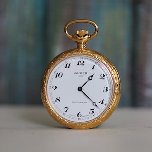 Anker pocket watch top