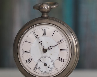 Antique  key winding pocket watch,  not  working