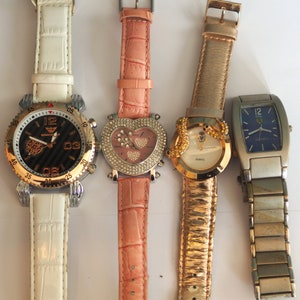 Lot  4x quartz watches , not tested, sold as not working