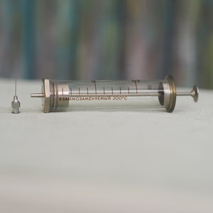Seringue en verre vintage inutilisée des années 1960 Injecteur hypodermique réutilisable médical