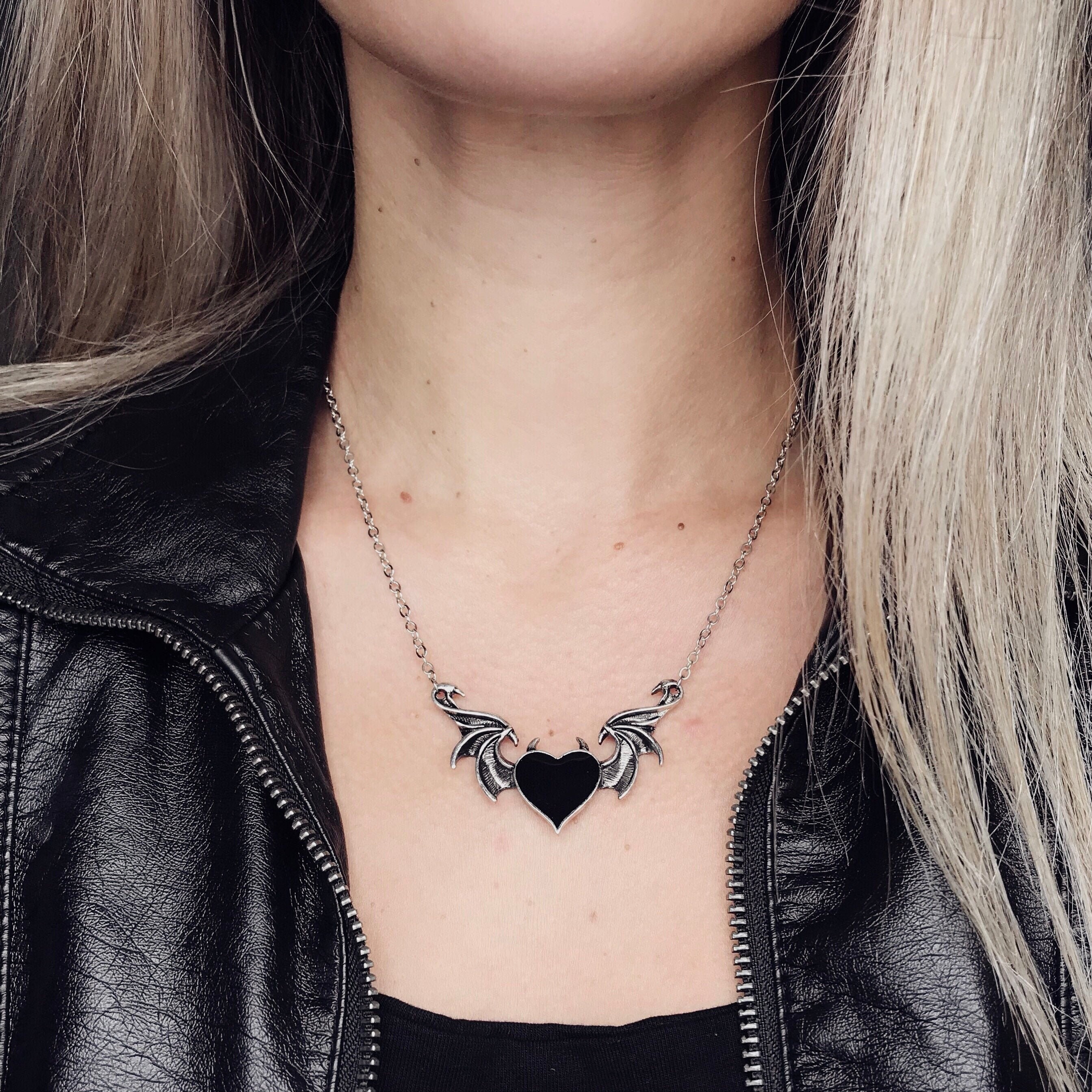 Winged heart necklace deals