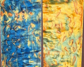 Curly birch dyed and stabilized planks for making a knife handle or wooden jewelry.