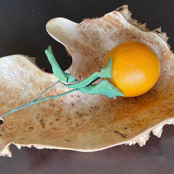 Hand crafted wooden bowl made of birch burl.