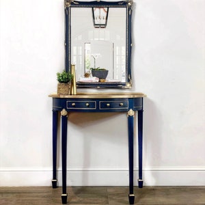 May include: A set of three ceramic mugs with a speckled, matte finish in cream, light grey, and dark grey. Each mug has a simple design and a rounded handle. Ideal for tea or coffee.