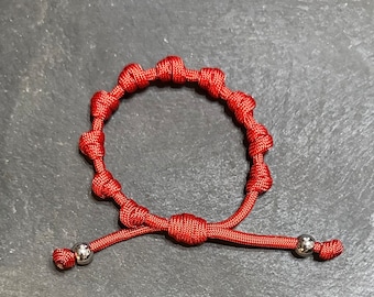 Bracciale rosario in paracord rosso (disponibile nella maggior parte degli altri colori)