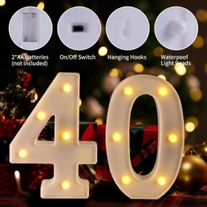 May include: White, battery-operated LED light-up numbers, shaped as the number 40. The numbers have warm yellow lights and are designed with hanging hooks and an on/off switch. The image also shows details like the battery compartment and waterproof light beads.