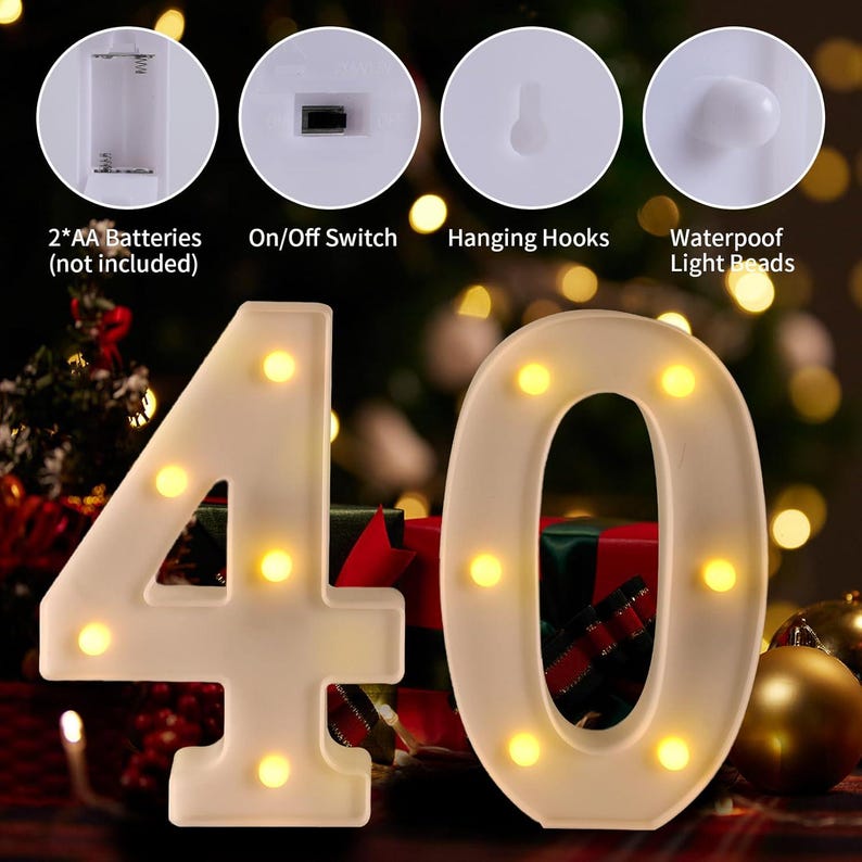 May include: White, battery-operated LED light-up numbers, shaped as the number 40. The numbers have warm yellow lights and are designed with hanging hooks and an on/off switch. The image also shows details like the battery compartment and waterproof light beads.