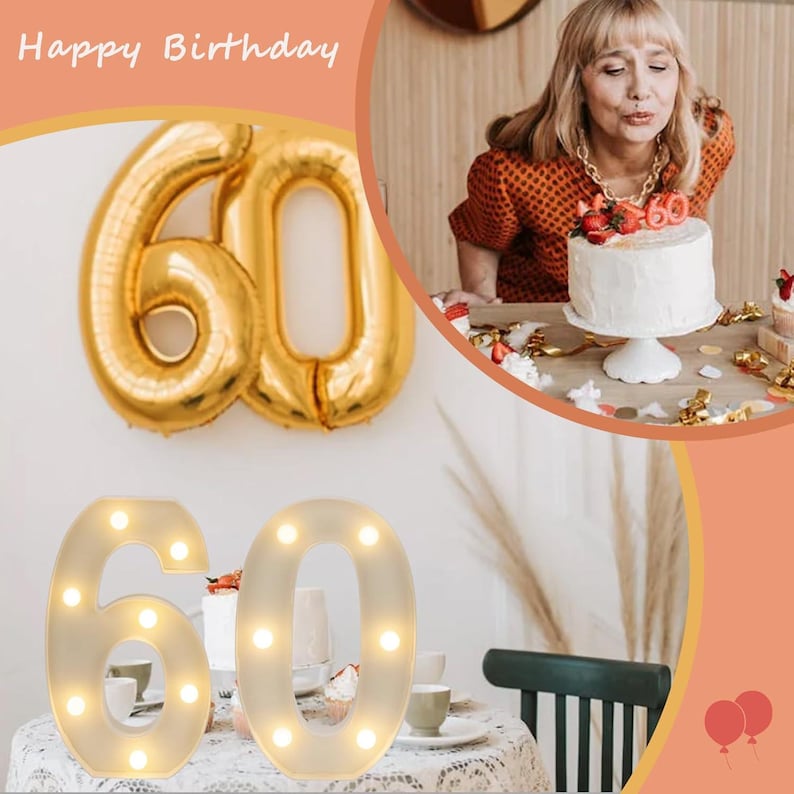 May include: A birthday celebration featuring a woman blowing out candles on a cake. Gold foil balloons in the shape of the number 60 are displayed. A lighted number 60 is on a table, with "Happy Birthday" written at the top.