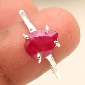 May include: A set of three ceramic mugs with a speckled, matte finish. The mugs are in shades of cream, light gray, and dark gray. Each mug has a simple, minimalist design and a rounded handle.