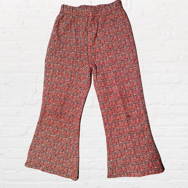 FIT AND FLARE KNIT PANTS PAVED IN PAISLEY
