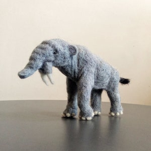 Deinotherium figure felt sculpture prehistoric proboscidean deinotherium giganteum extinct elephant