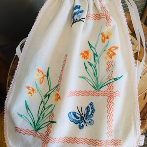 VINTAGE LINEN reimagined to a draw string kit BAG butterflies and florals of lovely original hand embroidery