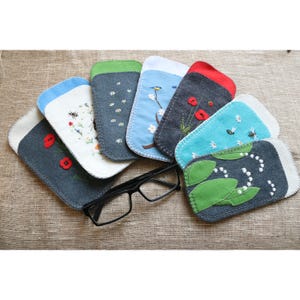 Hand sewn felt case for glasses. Floral theme.