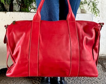 red leather weekend bag
