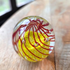 Vintage 1990s Hand-Blown Glass Paperweight – Red Swirls & Yellow Core – 3&quot; Art Glass Orb