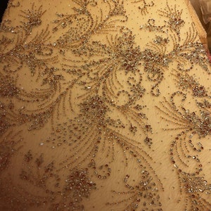 Fashion-forward Crystal Beaded Mesh for Haute Couture