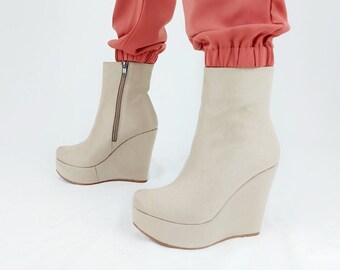 nude wedge booties
