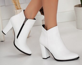 white flat heel boots