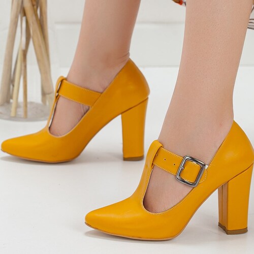 yellow t strap shoes