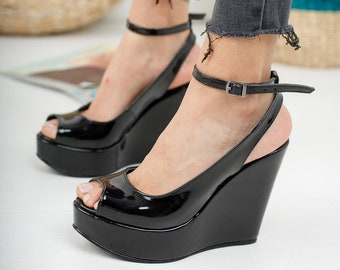 black closed toe wedges with ankle strap