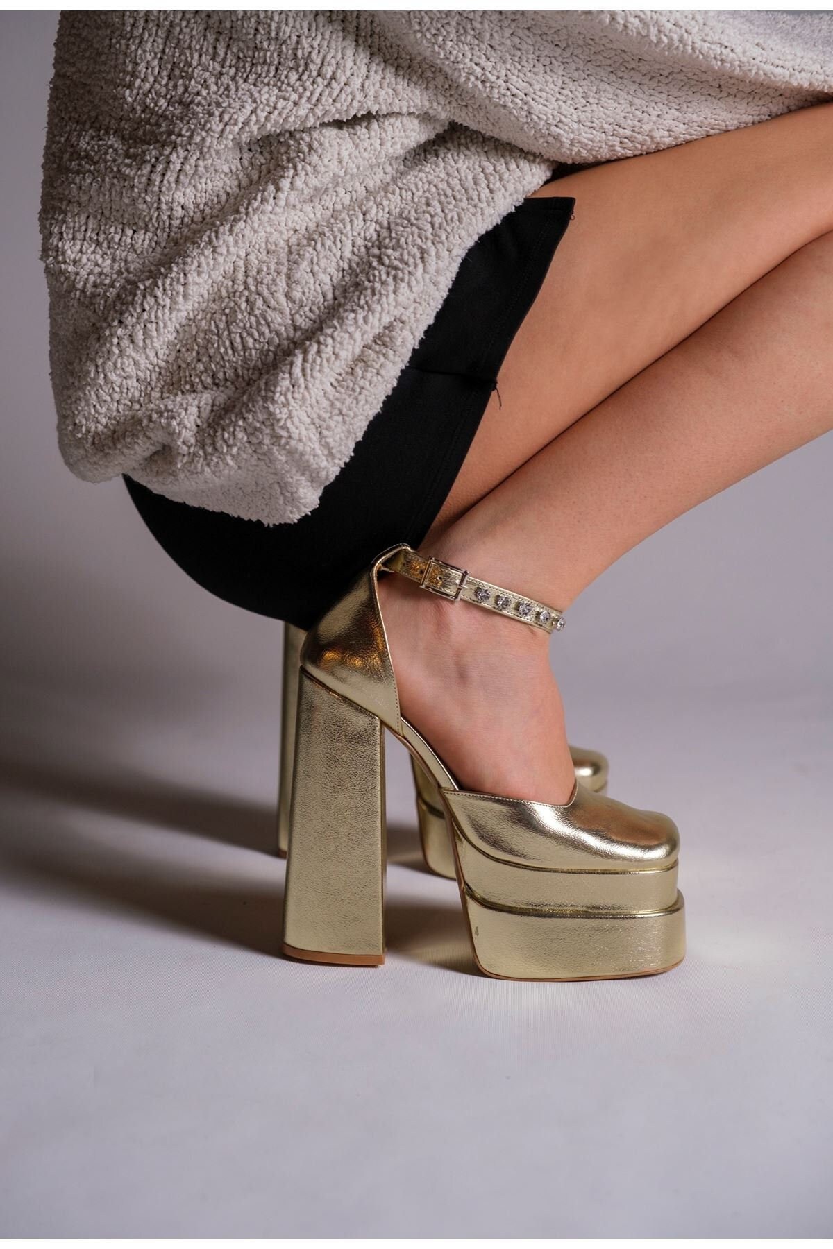chunky gold platform heels