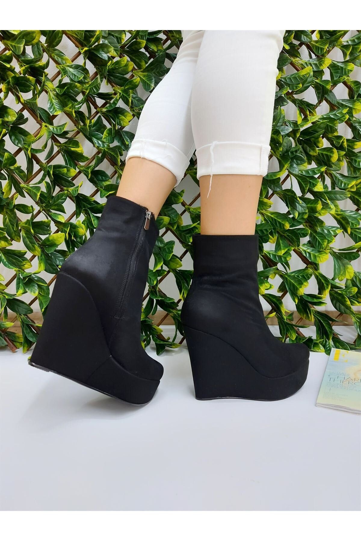 black suede boots with wedge heel