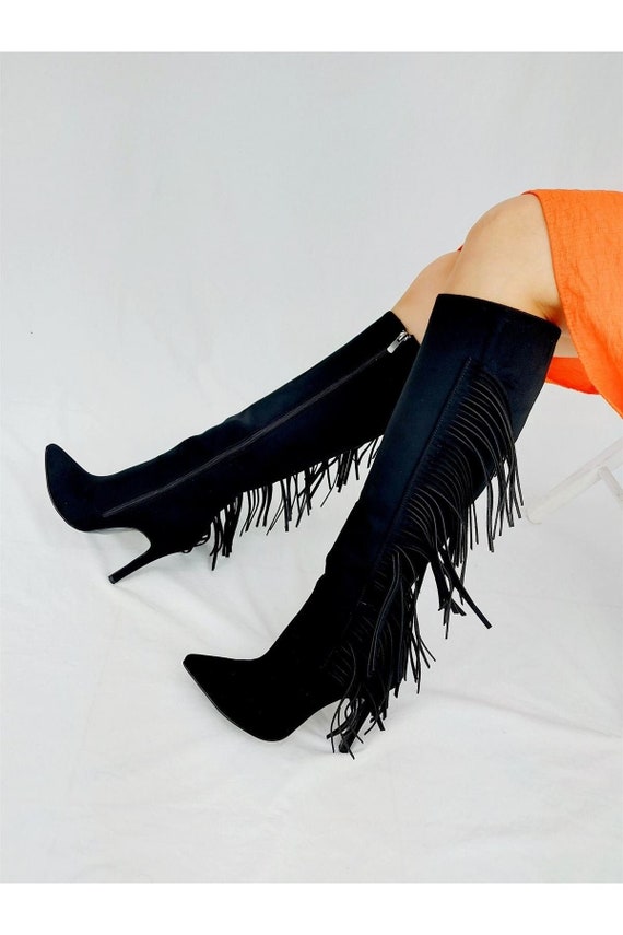 black suede booties with fringe