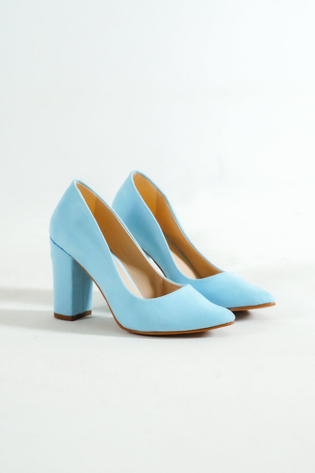 light blue suede pumps