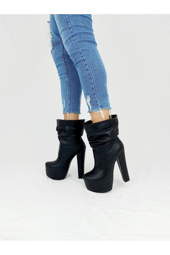 black platform boots with heels